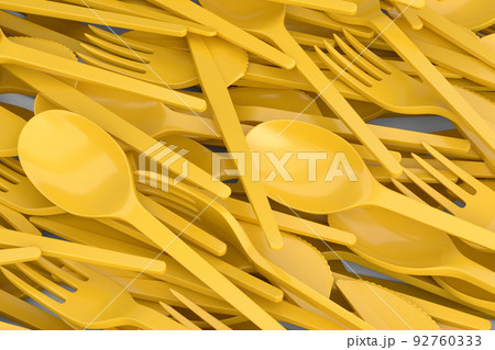 Heap of disposable utensils like spoon, fork and knife on white background. 92760333