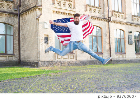 Join celebration. Patriotic guy expressing happiness 92760607