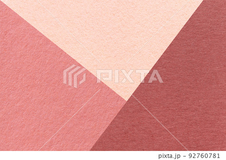 Texture of craft red, pink and coral shade color paper background, macro. Structure of vintage abstract rose cardboard 92760781