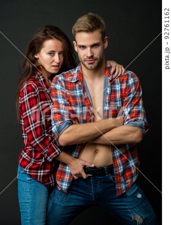 sexual young couple in love on black background, love 92761162