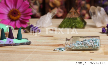 Incense Cones on Stone Slab With Crystals and Flowers Incense Cones on Stone Slab With Crystals and Flowers 92762156