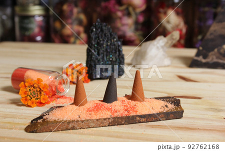Rock Crystal With Incense and Stone Pyramid on Meditation Altar 92762168