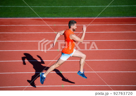man sprinter winner running from start to finish with success and speed, sport bodycare man sprinter winner running from start to finish with success and speed, sport bodycare 92763720