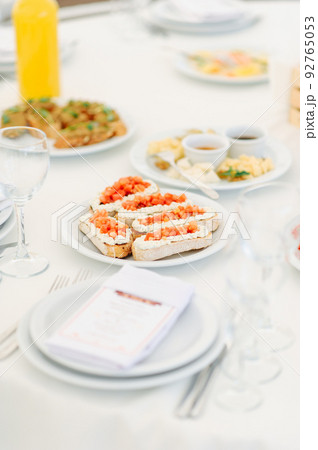 Table set at restaurant on light background 92765053