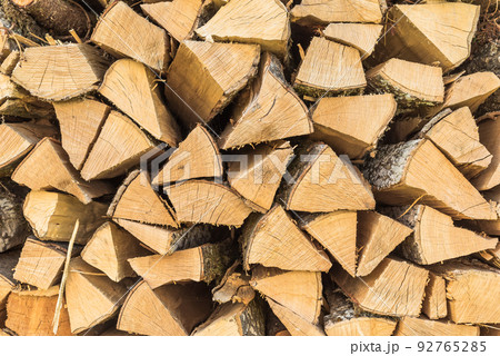 Woodpile, stacked and cut firewood 92765285