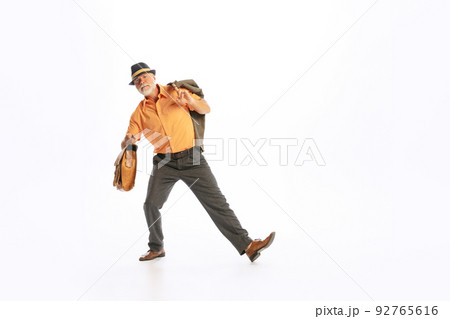 Portrait of emotional senior man in retro style clothes, vintage outfit posng isolated on white background. Concept of culture, art, music, fashion style, ad Portrait of emotional senior man in retro style clothes, vintage outfit posng isolated on white background. Concept of culture, art, music, fashion style, ad 92765616