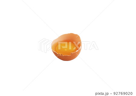 Broken chicken egg on a white background. Broken chicken egg on a white background. 92769020