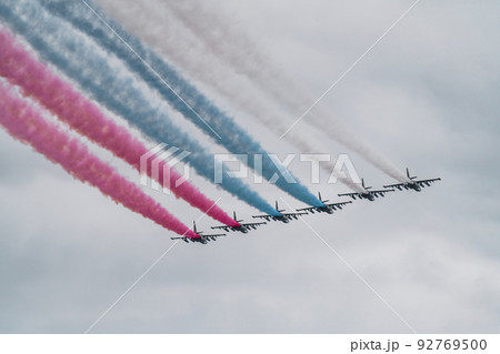 Russian Air Force planes paint the colors of the Russian flag in the sky on St. Petersburg during the celebration of the Day of the Navy Russian Air Force planes paint the colors of the Russian flag in the sky on St. Petersburg during the celebration of the Day of the Navy 92769500