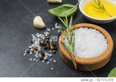 Food background from vegetable, spices, herb on black table. 92771159