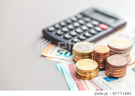 Euro coins on paper euro banknotes Euro coins on paper euro banknotes 92771885