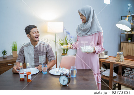 muslim couple having break fast or sahur in the morning muslim couple having break fast or sahur in the morning 92772852