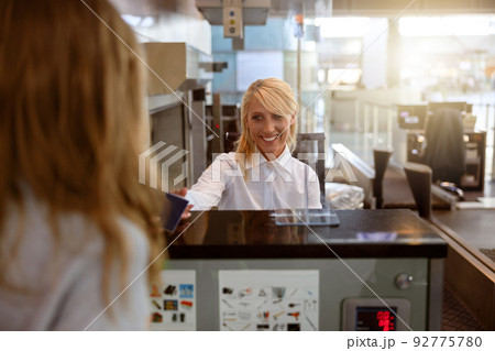 Attractive employee of the control service going to check the documents 92775780