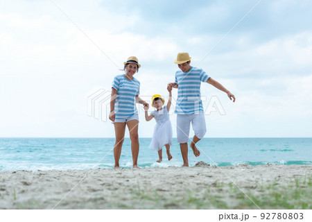 Happy family summer sea beach vacation. Asia young people lifestyle travel enjoy fun 92780803