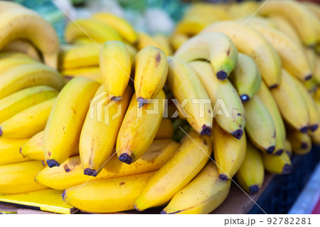 close up of mature bananas on counter in marketplace close up of mature bananas on counter in marketplace 92782281