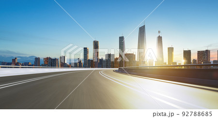 3d rendering highway overpass motion blur with city 92788685