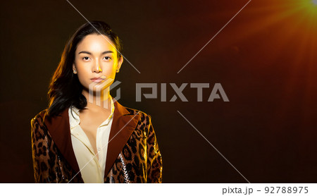 Half body portrait of Asian beautiful woman wear formal blazer, unisex handsome man look make up 92788975