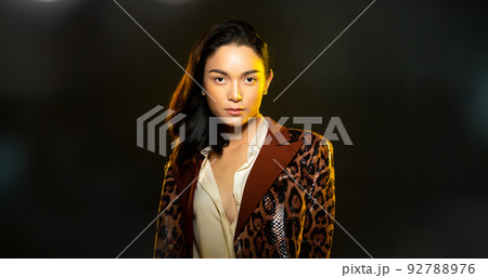 Half body portrait of Asian beautiful woman wear formal blazer, unisex handsome man look make up 92788976