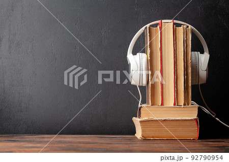 Old books and headphones 92790954
