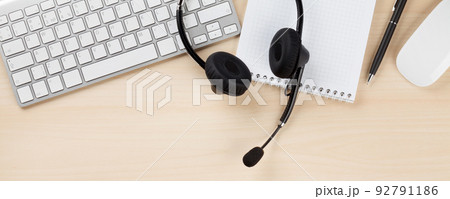 Office desk with headset. Call center support Office desk with headset. Call center support 92791186
