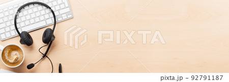 Office desk with headset and pc Office desk with headset and pc 92791187