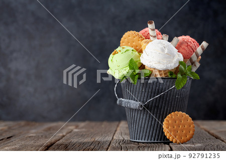 Various ice cream in waffle cones 92791235