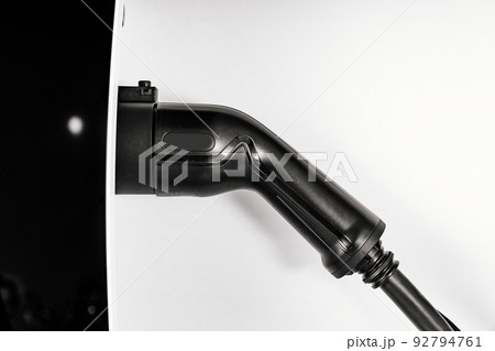part of a new electric car charger on a white background. part of a new electric car charger on a white background. 92794761