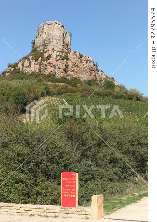 Rock of Solutre with vineyards, Burgundy, France Rock of Solutre with vineyards, Burgundy, France 92795574