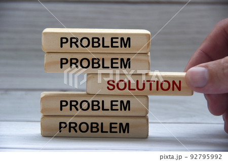 Problem and solution text on wooden blocks. Solution concept 92795992
