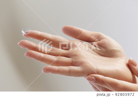 Contact Eye Lenses. Woman Hands Holding Contact Eye Lens Contact Eye Lenses. Woman Hands Holding Contact Eye Lens 92803972