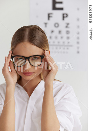 Visual Health. Female With Beautiful Face At Ophthalmologist Office Visual Health. Female With Beautiful Face At Ophthalmologist Office 92803973