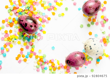 Easter background of pastry topping and quail eggs 92804675