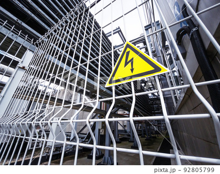 The sign in the yellow triangle is Danger The sign in the yellow triangle is Danger 92805799