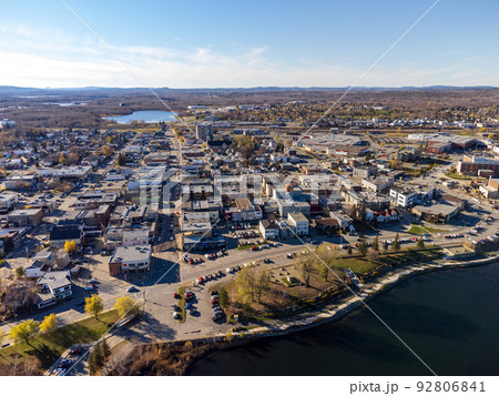 Aerial panoramic view of Rouyn-Noranda City and Osisko Lake on sunset time. Abitibi-Temiscamingue, Quebec, Canada. Aerial panoramic view of Rouyn-Noranda City and Osisko Lake on sunset time. Abitibi-Temiscamingue, Quebec, Canada. 92806841