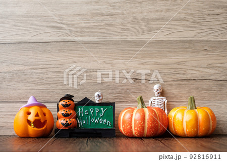 Happy Halloween day with ghost, pumpkin, bowl and decorative. Trick or Threat, Hello October, fall autumn, Festive, party and holiday concept Happy Halloween day with ghost, pumpkin, bowl and decorative. Trick or Threat, Hello October, fall autumn, Festive, party and holiday concept 92816911