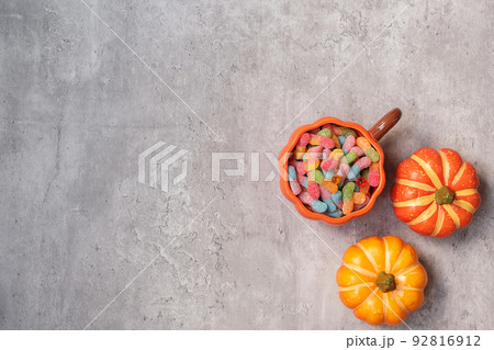 Happy Halloween day with ghost candies, pumpkin, bowl and decorative. Trick or Threat, Hello October, fall autumn, Festive, party and holiday concept Happy Halloween day with ghost candies, pumpkin, bowl and decorative. Trick or Threat, Hello October, fall autumn, Festive, party and holiday concept 92816912
