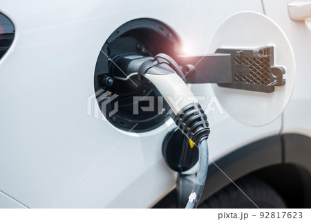 Electric car charging battery at EV charger station or home. green energy power, Eco friendly alternative, technology and environment concepts 92817623