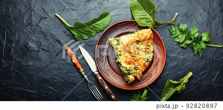 Cheese pie with spinach, copy space 92820897