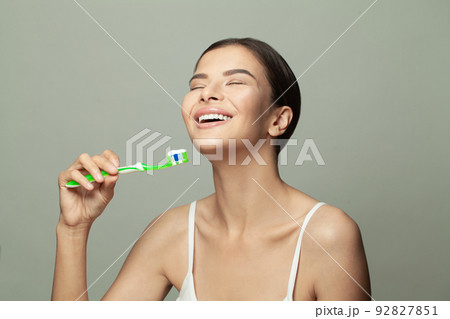 Beautiful young woman smile. Dental health background. Beautiful young woman smile. Dental health background. 92827851