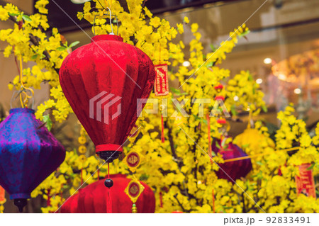 Yellow flowers in honor of the Vietnamese new year. Lunar new year flower market. Chinese New Year. Tet Yellow flowers in honor of the Vietnamese new year. Lunar new year flower market. Chinese New Year. Tet 92833491