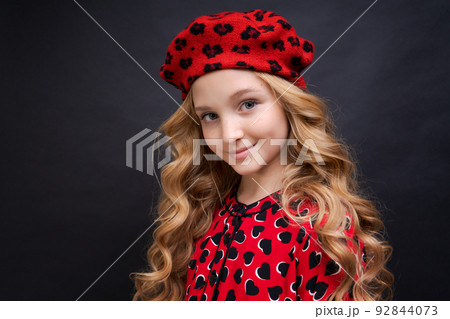 Beautiful attractive fashionable cheerful cheerful long-haired girl in street Beautiful attractive fashionable cheerful cheerful long-haired girl in street 92844073