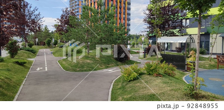 children's playground in a modern residential complex of apartment buildings 92848955