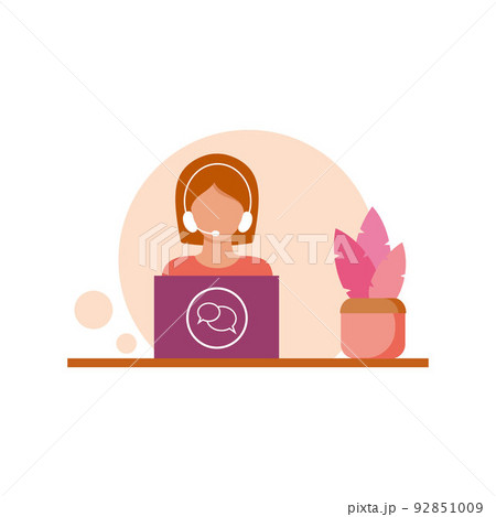 A call center or support Manager is sitting at a laptop. A technical support specialist with headphones and a microphone is working at the computer. 92851009