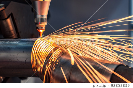 CNC Laser cutting of metal, modern industrial technology. 92852839