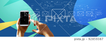 Email concept with person using smartphone Email concept with person using smartphone 92859387
