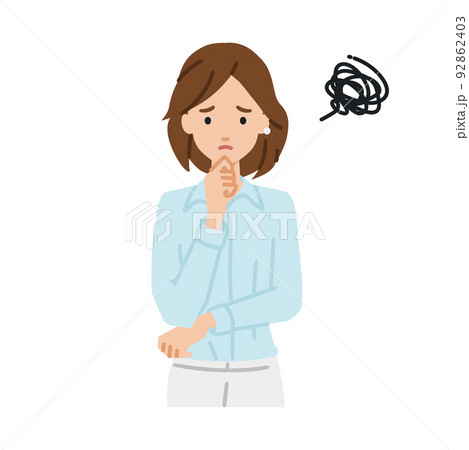 立って手をあごにあてて困っているブラウスの女性 92862403