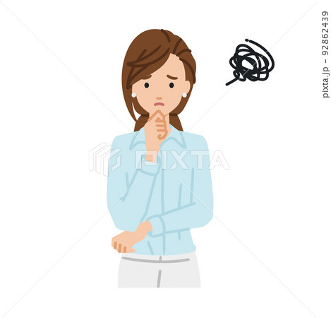 立って手をあごにあてて困っているブラウスの女性 92862439