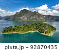 Aerial drone view of Frog island, tropical Mountain peak on the lake, Khao Sok National Park, Thailand 92870435