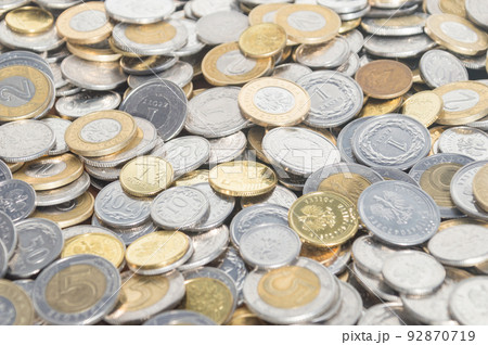 PLN, polish zloty coins as background. PLN, polish zloty coins as background. 92870719