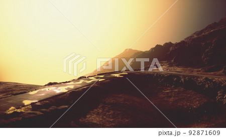 Country road through the beautiful mountain landscape Country road through the beautiful mountain landscape 92871609
