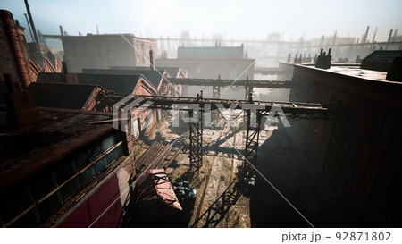 Abandoned factory with concrete ruins in industrial district Abandoned factory with concrete ruins in industrial district 92871802